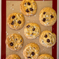 image of no chill chocolate chip cookies that have been garnished with flakey sea salt