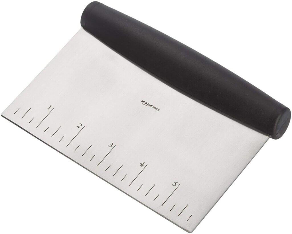 photo of bench scraper, a tool used to smooth frosting in cake decorating