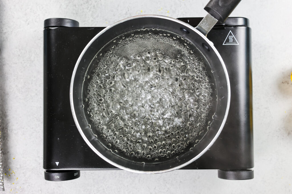 image of simple syrup being brought to a boil to dissolve the sugar