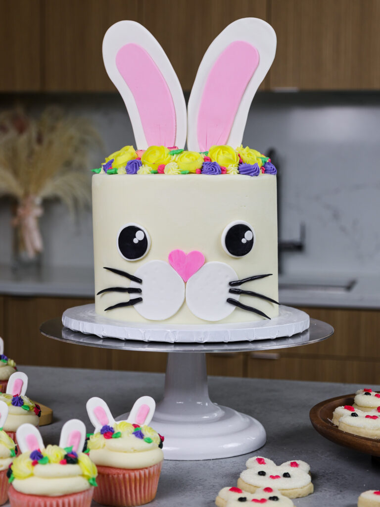 image of a bunny birthday cake made with funfetti cake layers and homemade vanilla buttercream