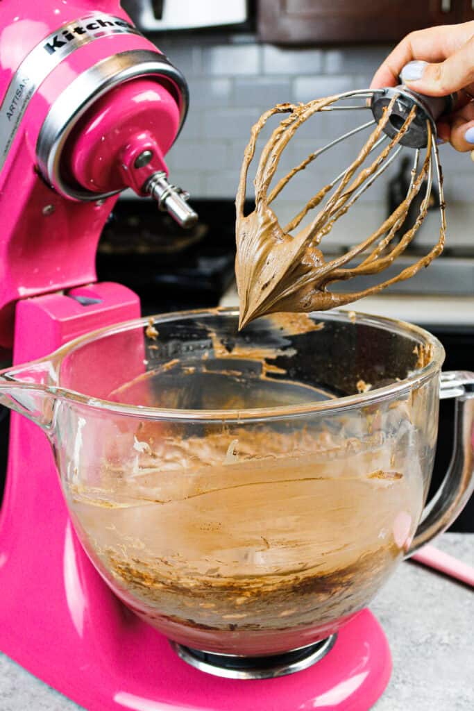 image of chocolate russian buttercream on a whisk attachment 