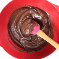 image of chocolate ganache frosting made by chelsweets with milk chocolate and heavy cream