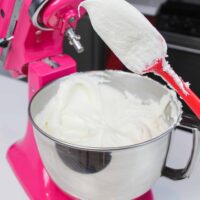 image of buttercream frosting being tested for the right consistency