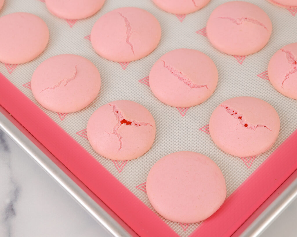 image of cracked italian macaron shells