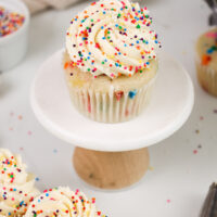 image of a cupcake frosted with perfectly sweet buttercream frosting