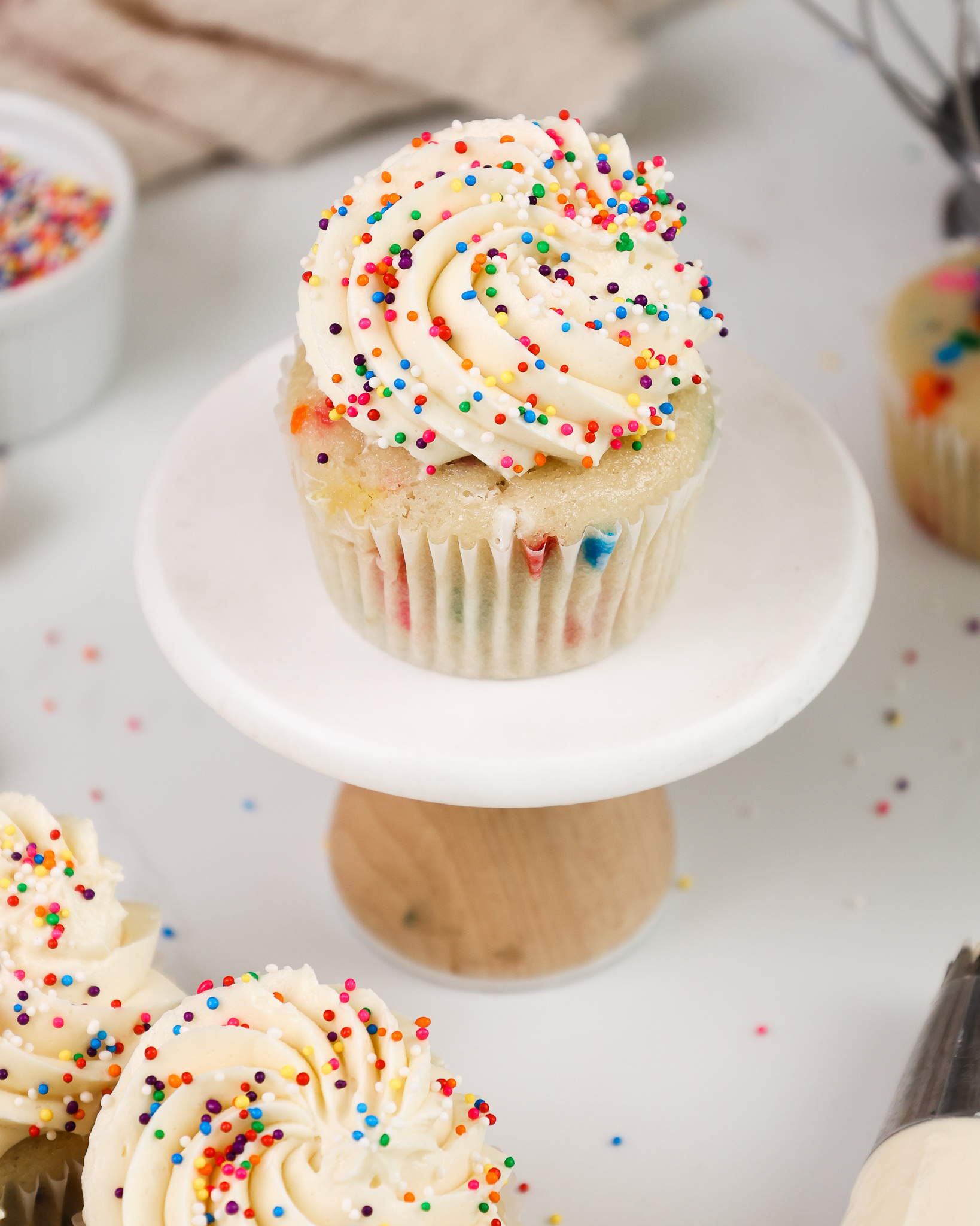 image of a cupcake frosted with perfectly sweet buttercream frosting