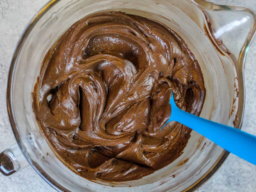 image of dark chocolate orange buttercream frosting in a bowl