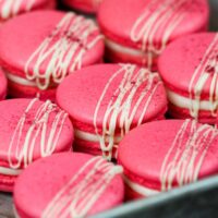 image of french meringue that's been colored pink with gel food coloring to make raspberry macarons