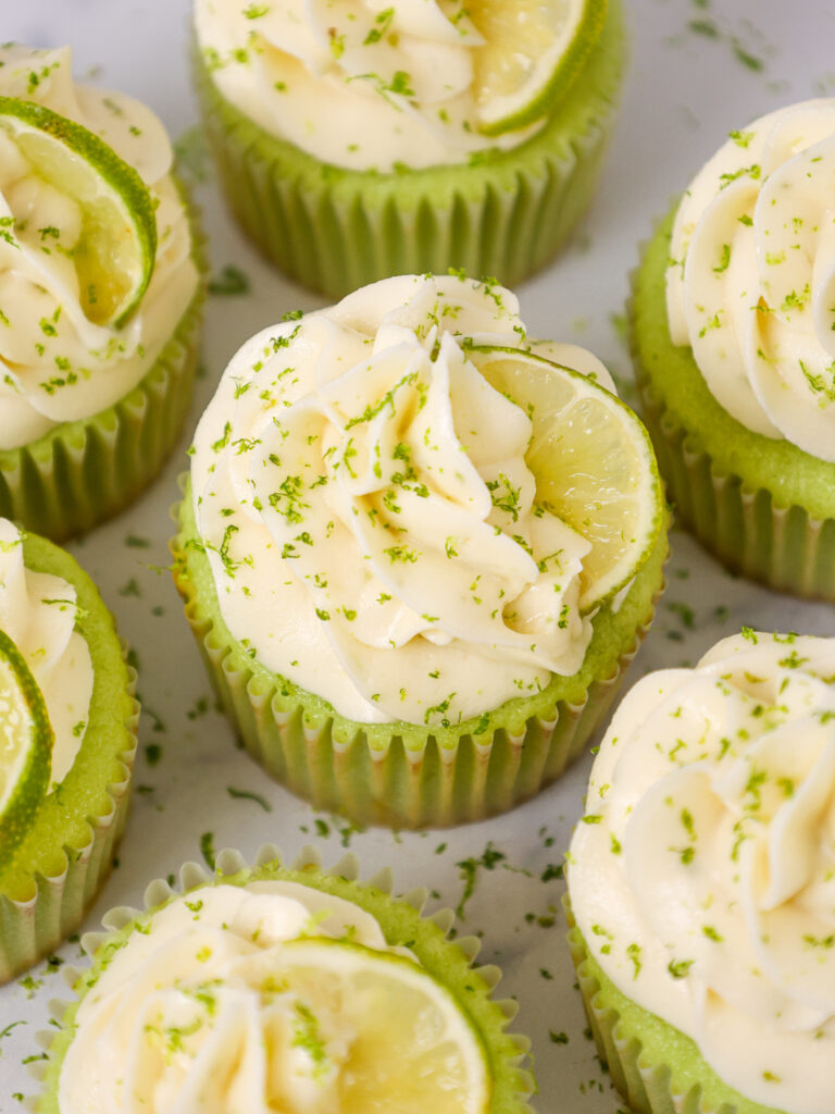 image of lime cupcakes that've been decorated with delicious lime buttercream and filled with homemade lime curd