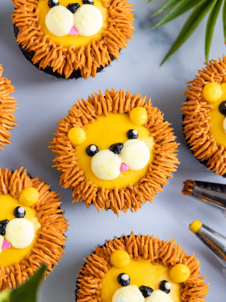 image of cute lion cupcakes that have been decorated with buttercream frosting
