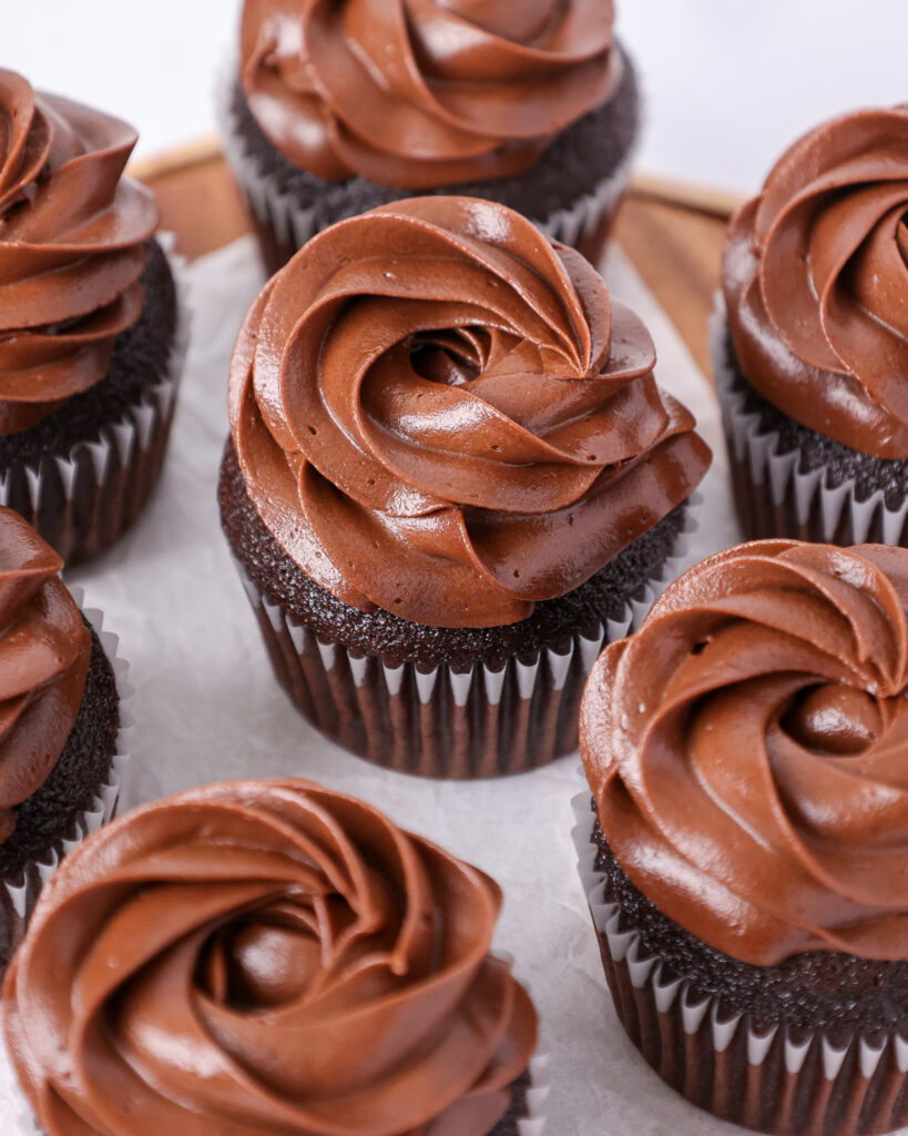 image of moist chocolate cupcakes that have been frosted with a decadent dark chocolate buttercream