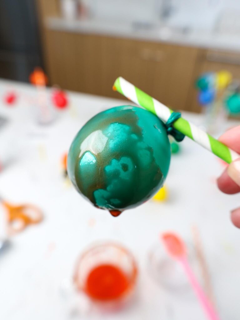 image of a gelatin balloon that was coated in too much shortening which prevented the gelatin from properly coating it