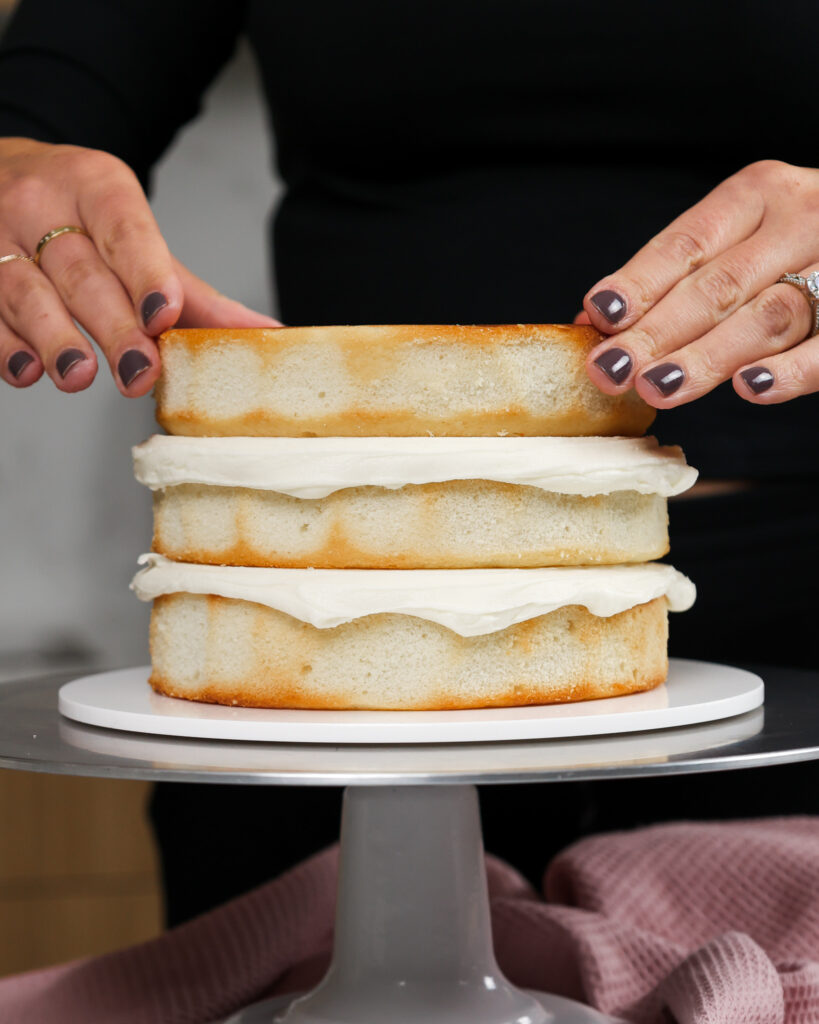 image of a cute small cake made with 3, 6-inch cake layers