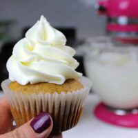 image of cream cheese buttercream frosted onto a pumpkin cupcake