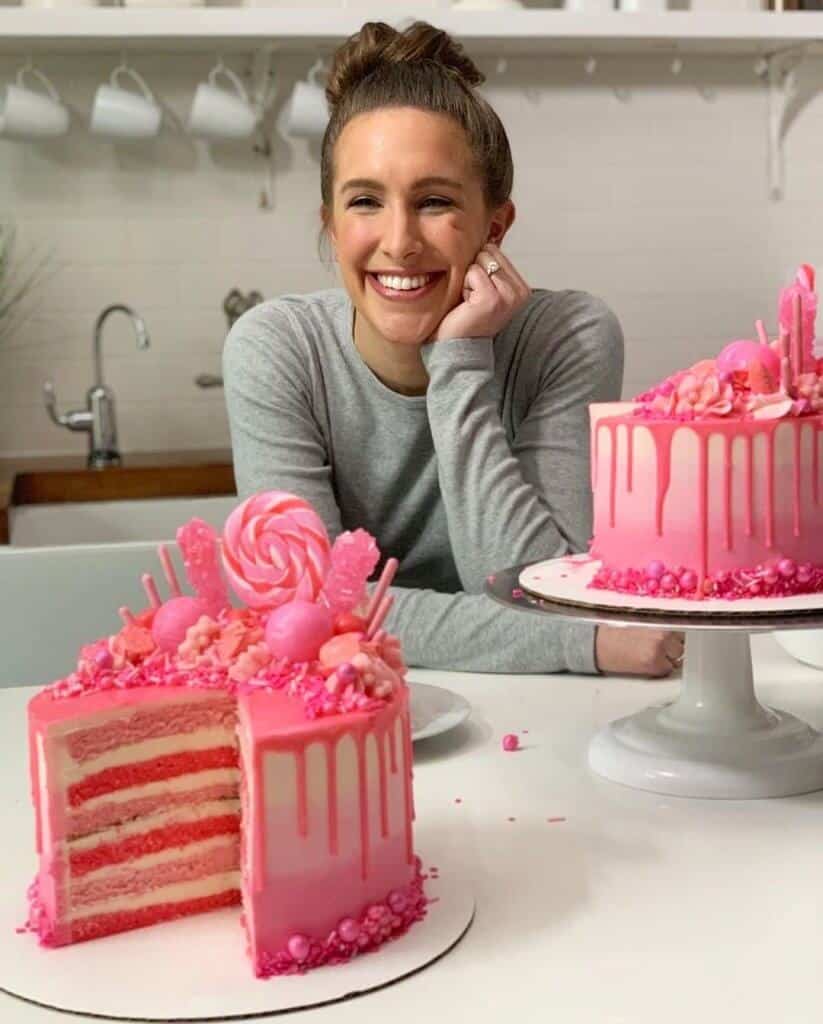 Photo of Chelsey White with pink candy drip cake