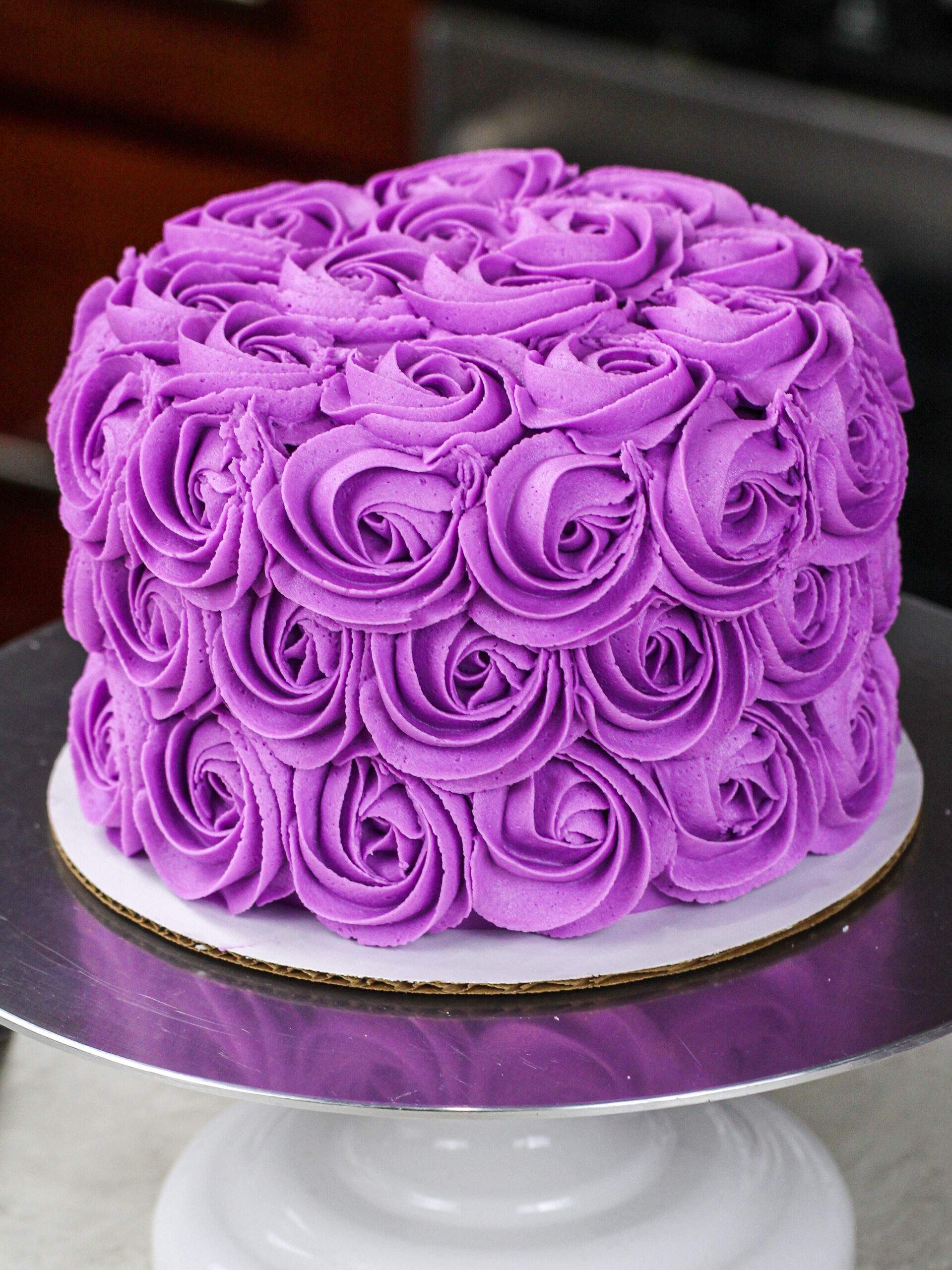 image a of a purple buttercream rosette made as part of a buttercream rosette tutorial