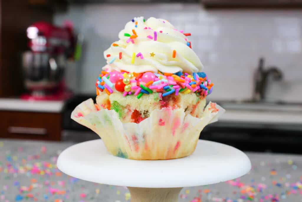 image of funfetti cupcake decorated with pretty sprinkles