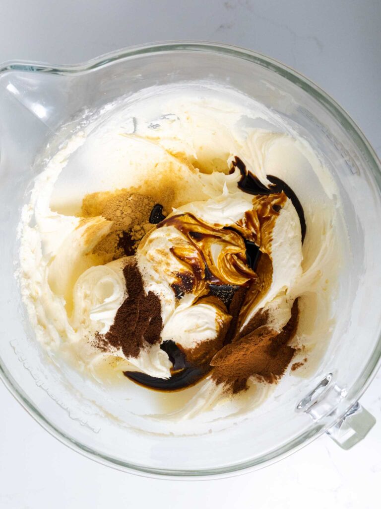 image of gingerbread buttercream being made in a glass bowl