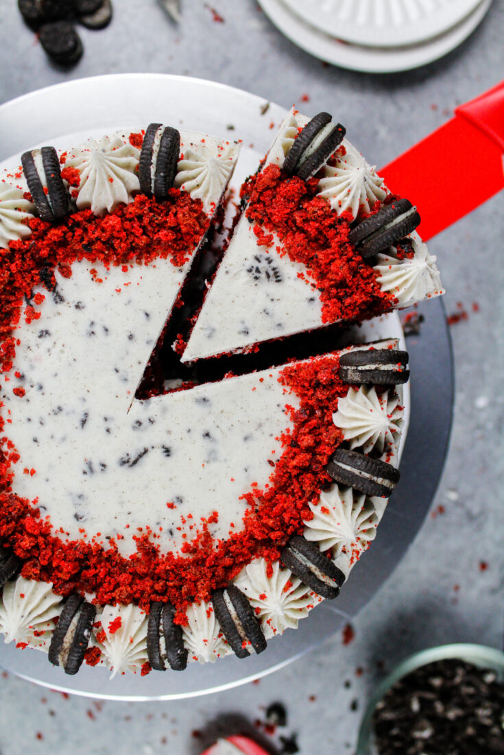 image of a red velvet oreo cake frosted with an oreo cream cheese buttercream