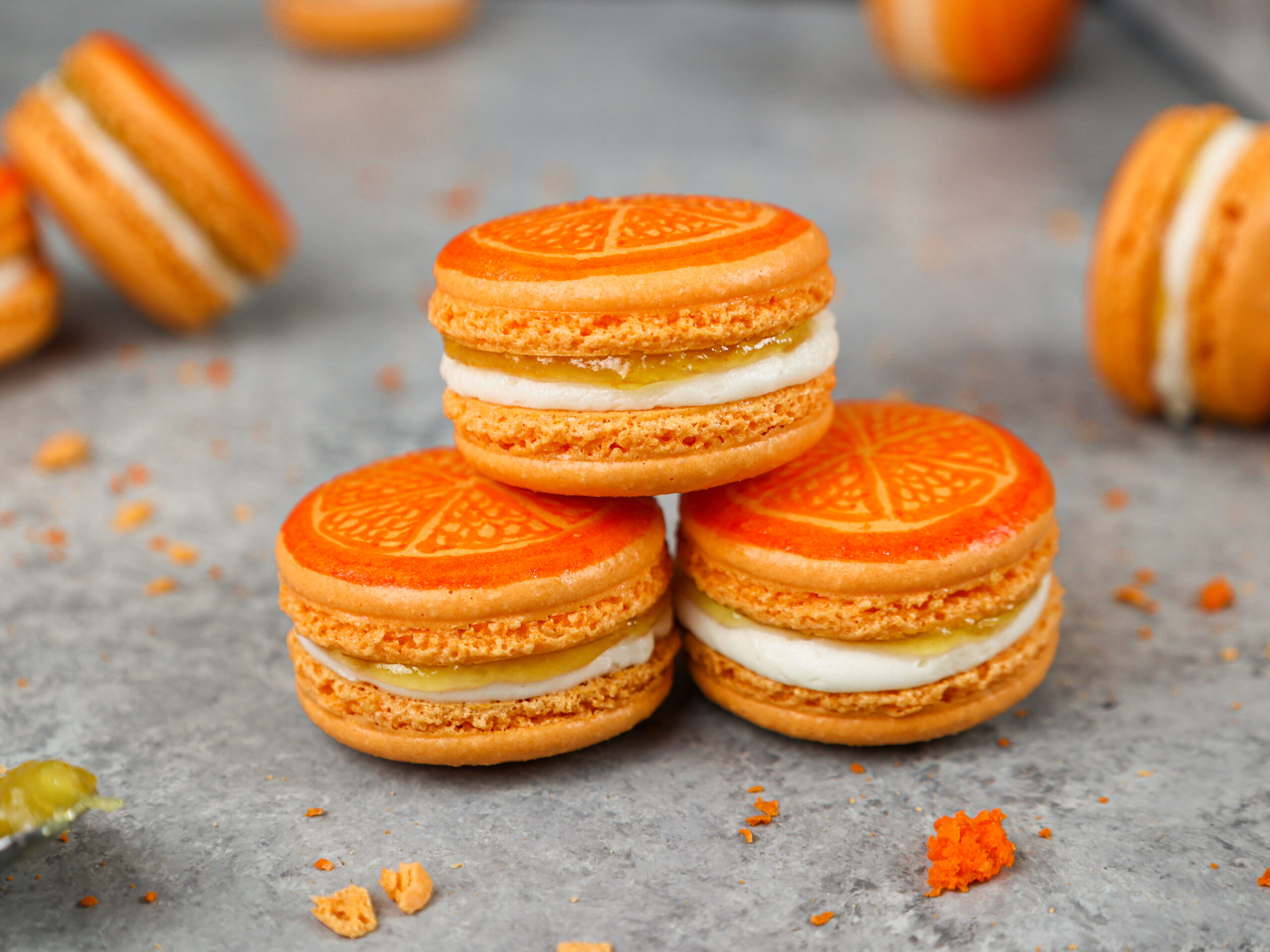 image of adorable orange macarons filled with orange marmalade and buttercream