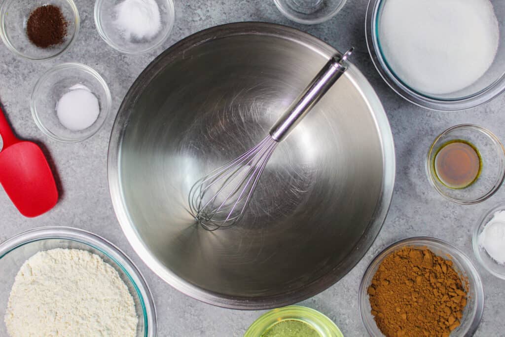 image of ingredients mise en place for a gluten free chocolate cake batter being made from scratch