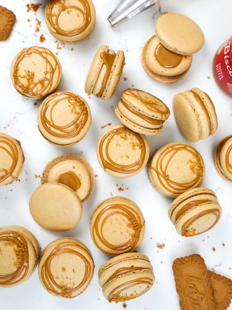 image of biscoff macarons that have been filled with biscoff buttercream and cookie butter