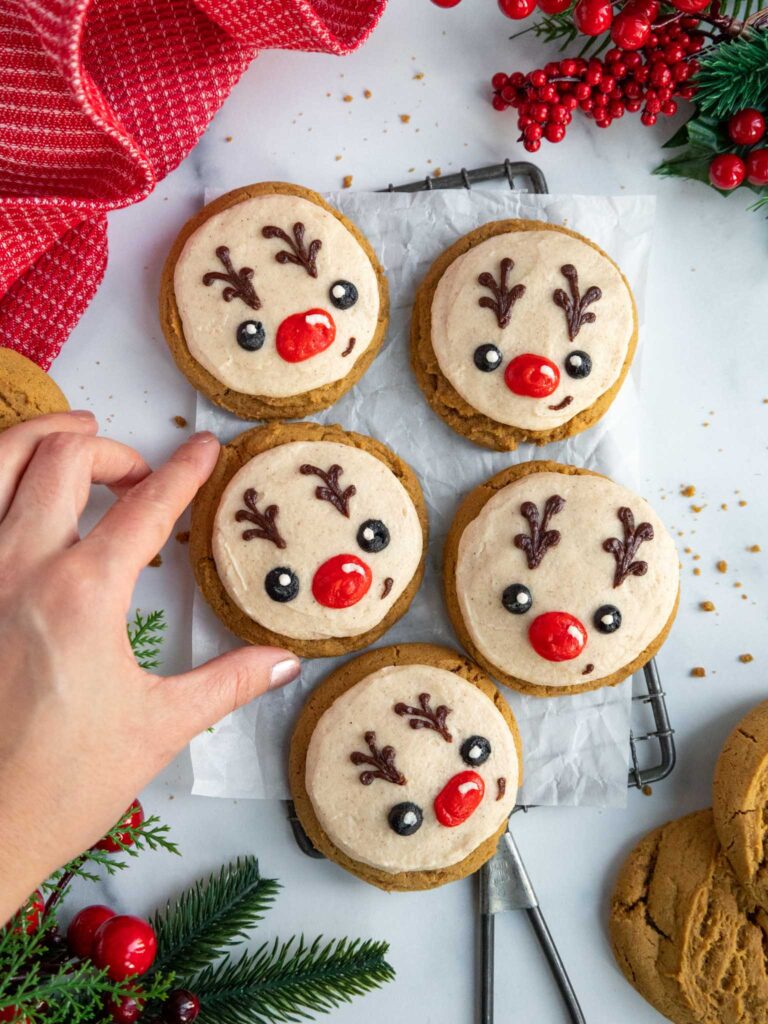 image of cute buttercream gingerbread reindeer cookies