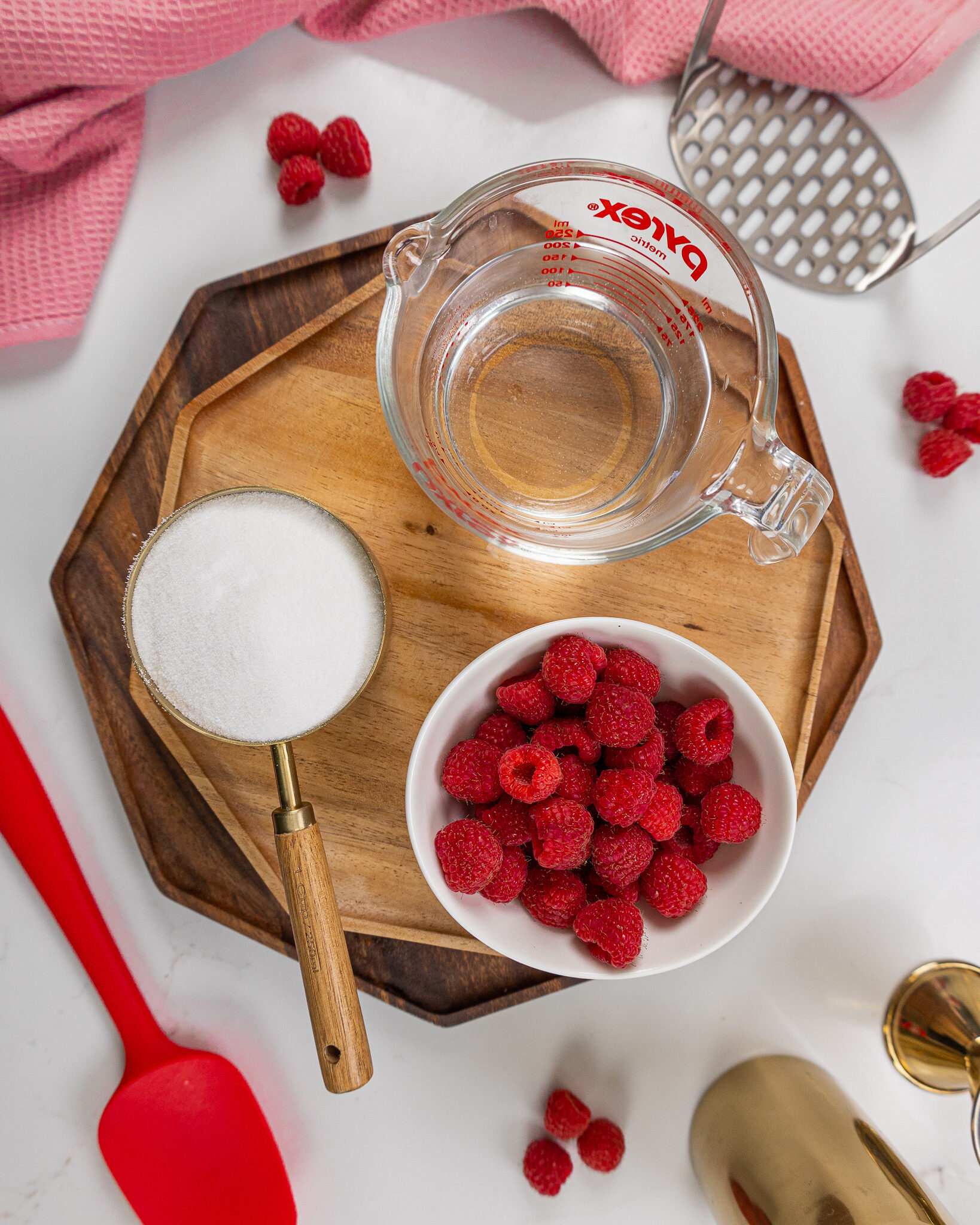 image of ingredients laid out to make raspberry simple syrup