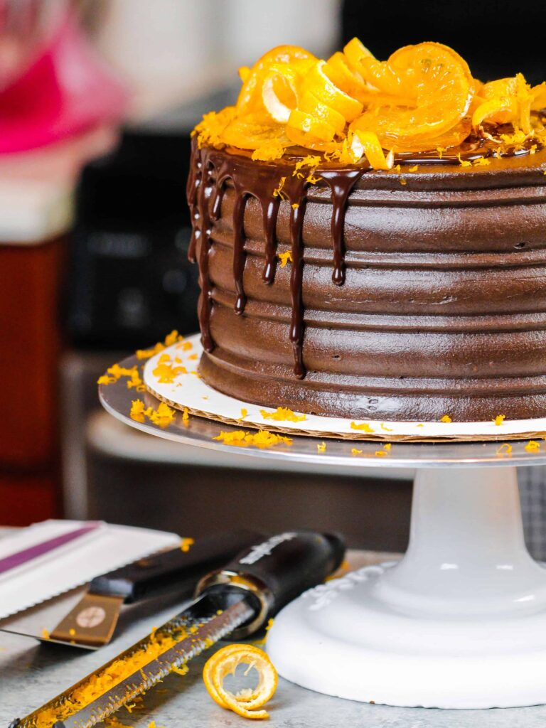 image of orange chocolate cake decorated with a chocolate drip