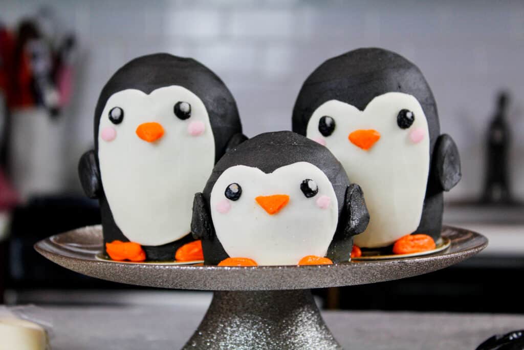 image of penguin cupcakes with baby penguin