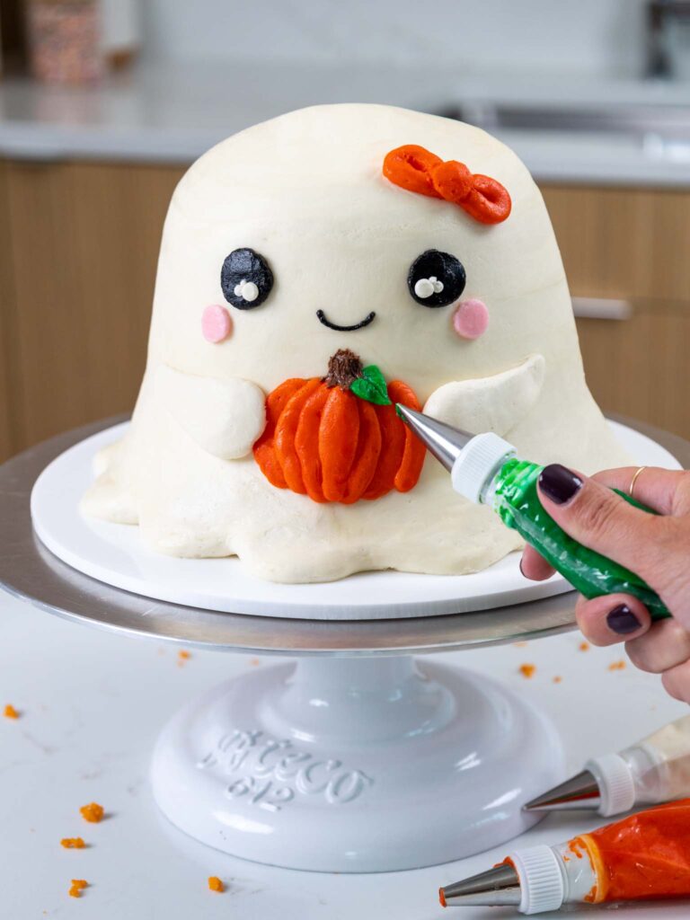 image of a cute ghost cake that's been frosted with buttercream frosting