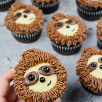 image of adorable sloth cupcakes made with chocolate cupcakes and chocolate peanut butter frosting