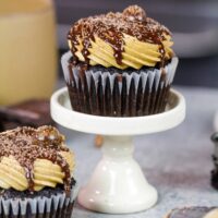 image of mocha cupcakes frosted with espresso buttercream frosting and drizzled with espresso ganache