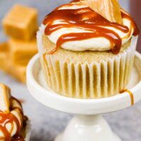 image of caramel cupcakes filled with chewy caramel and topped with a caramel drizzle