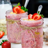 image of peanut butter and jelly overnight oats made in cute mason jars