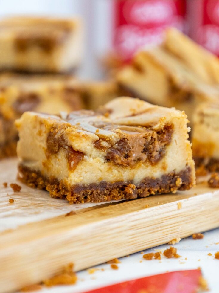 image of biscoff cheesecake bars cut up to show their biscoff cookie butter swirl