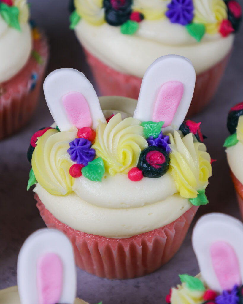 image of adorable and easy to make bunny cupcakes made with buttercream and fondant ears