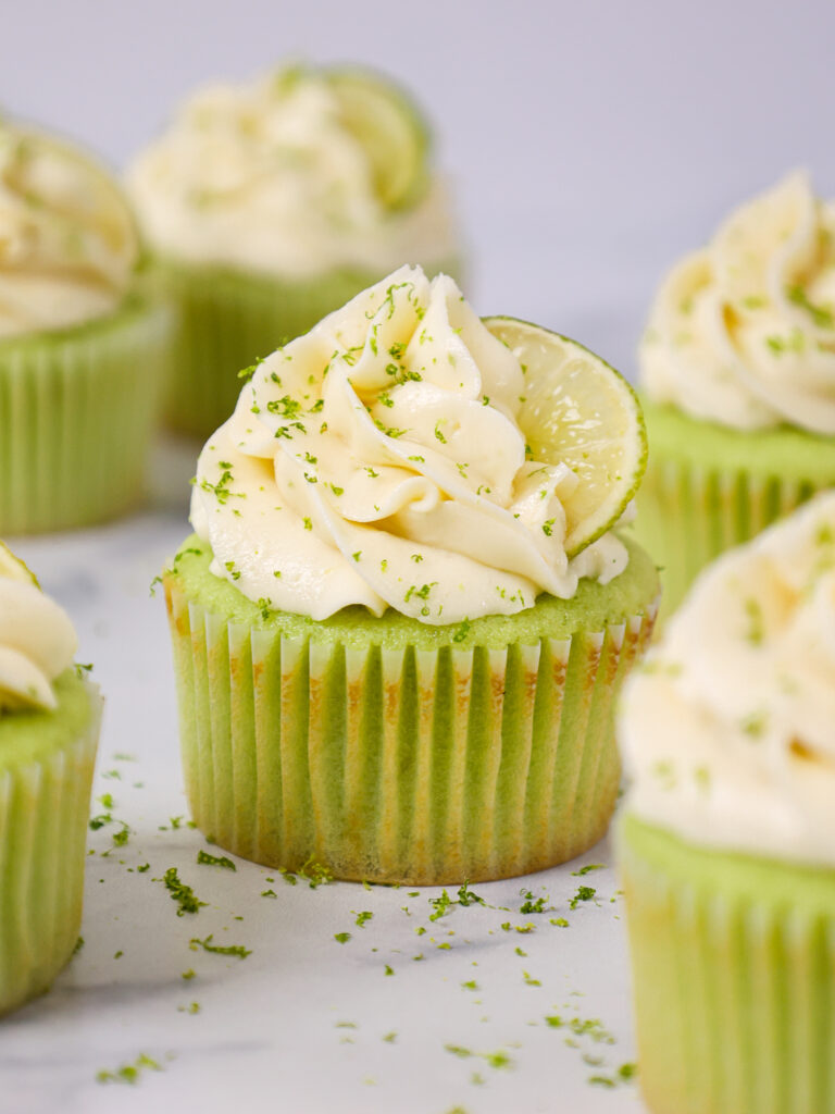 image of lime cupcakes that've been decorated with delicious lime buttercream and filled with homemade lime curd