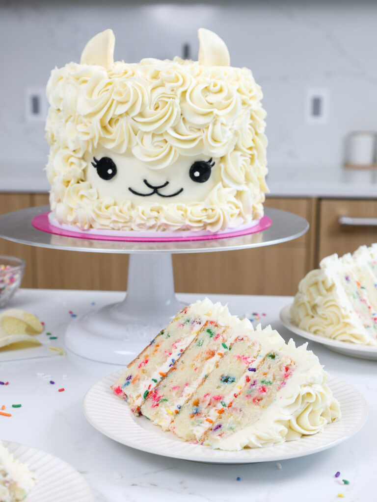 image of an easy llama cake that's been made with buttercream and funfetti cake layers