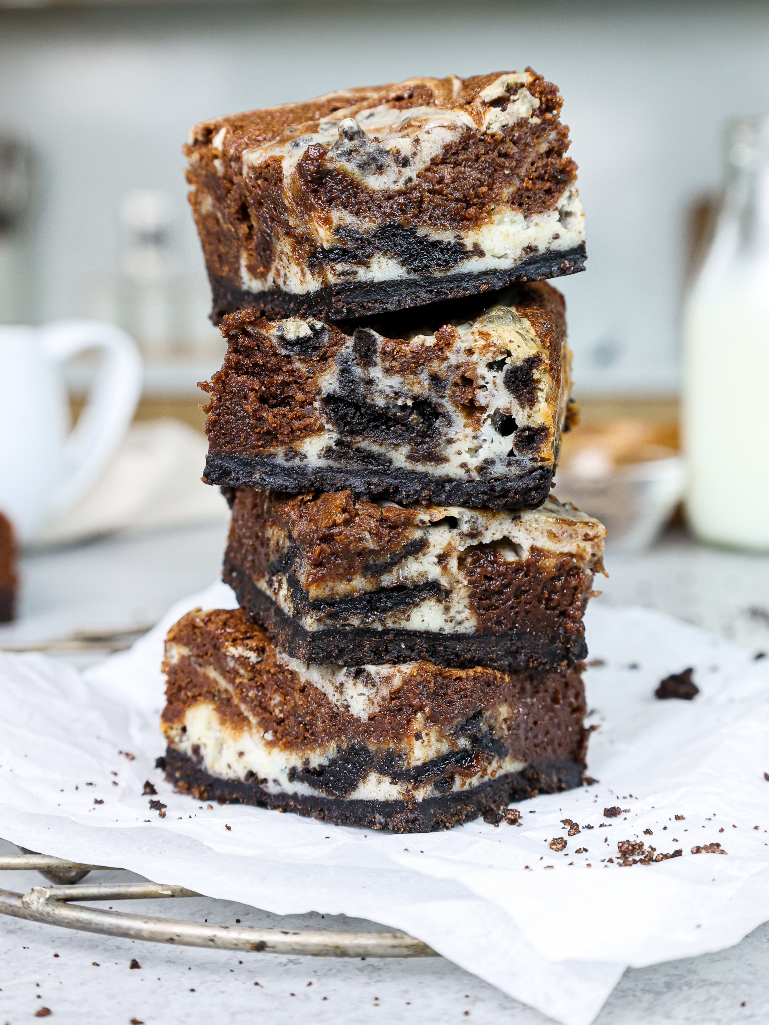 image of oreo cheesecake brownies stacked on top of each other