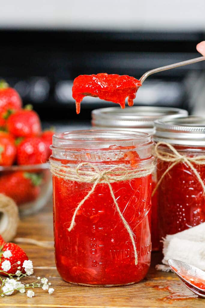 image of a spoonful of certo strawberry freezer jam that is set and ready to be eaten