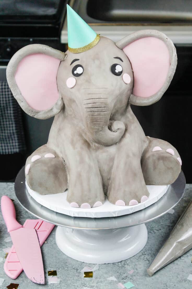 image of an elephant cake made mostly with buttercream and a little pink fondant
