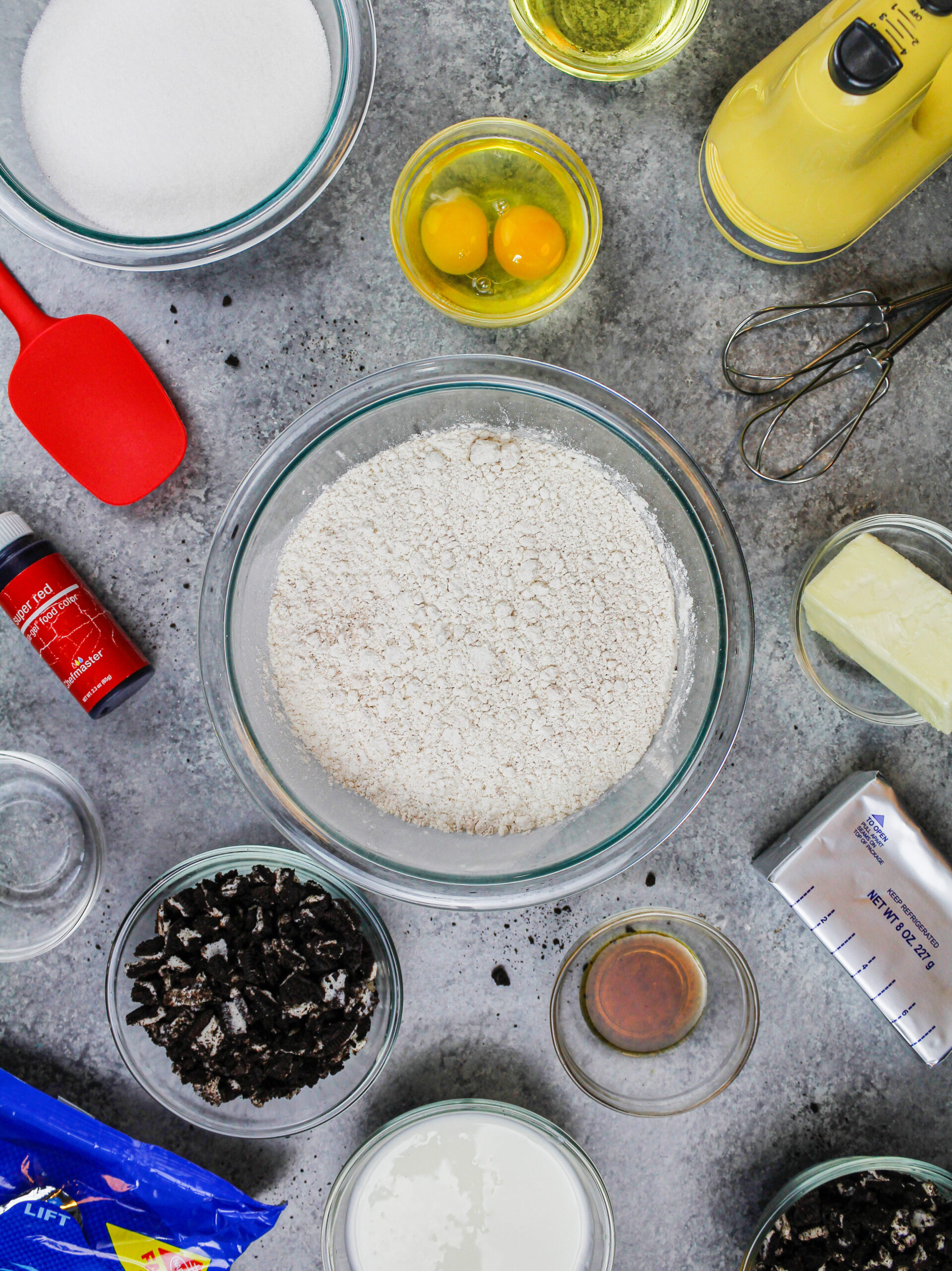 image of ingredients laid out to make a red velvet oreo cake