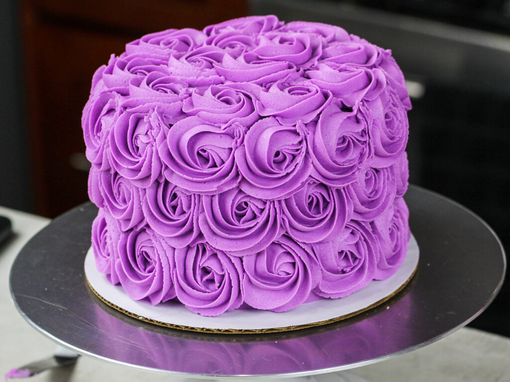 image a of a purple buttercream rosette made as part of a buttercream rosette tutorial