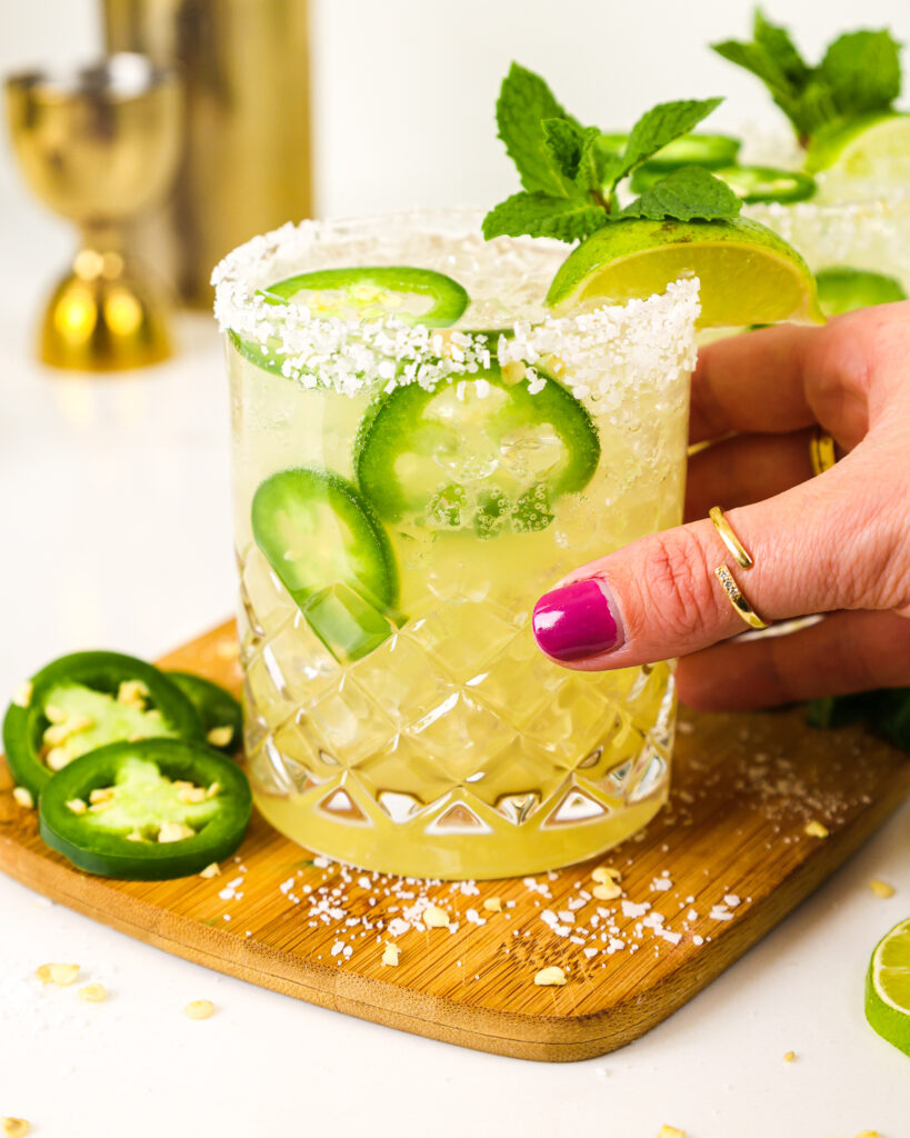 image of a spicy skinny margarita recipe made in a glass garnished with lime sugar