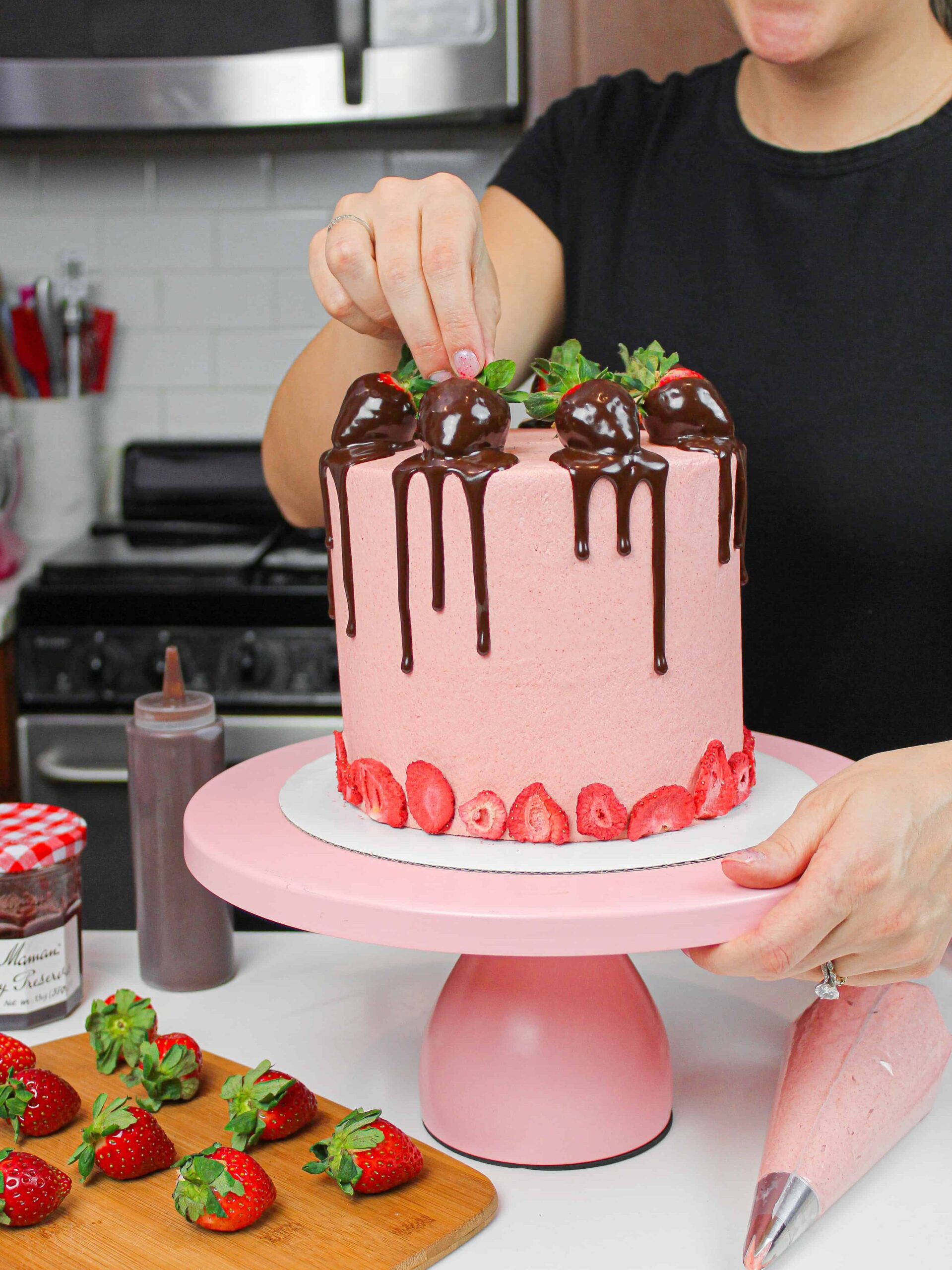 image of chocolate dipped strawberry cake with chocolate ganache and strawberry buttercream