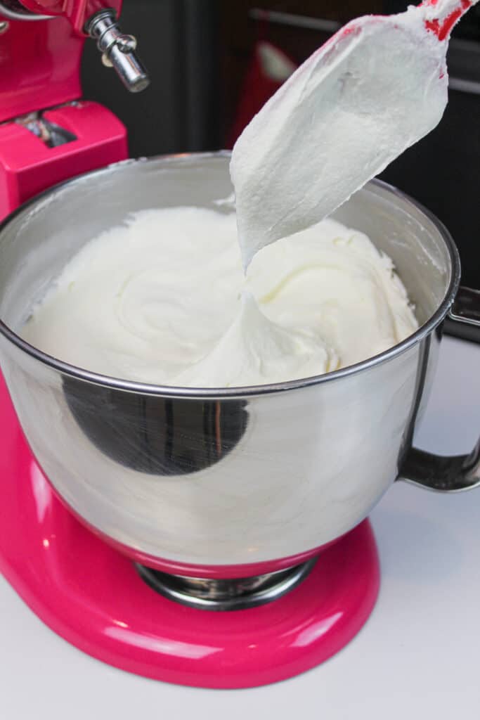 image of buttercream frosting being tested for the right consistency