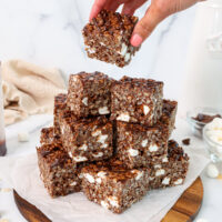 image of chocolate rice krispie treats being stacked in a pile