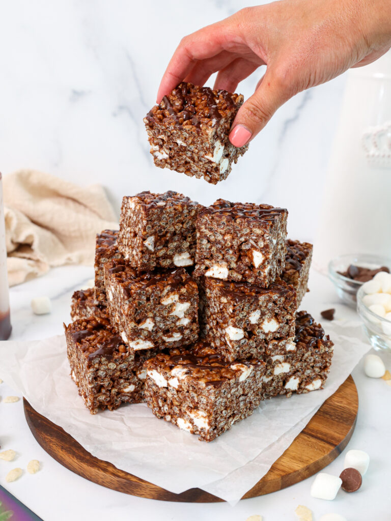 image of chocolate rice krispie treats being stacked in a pile