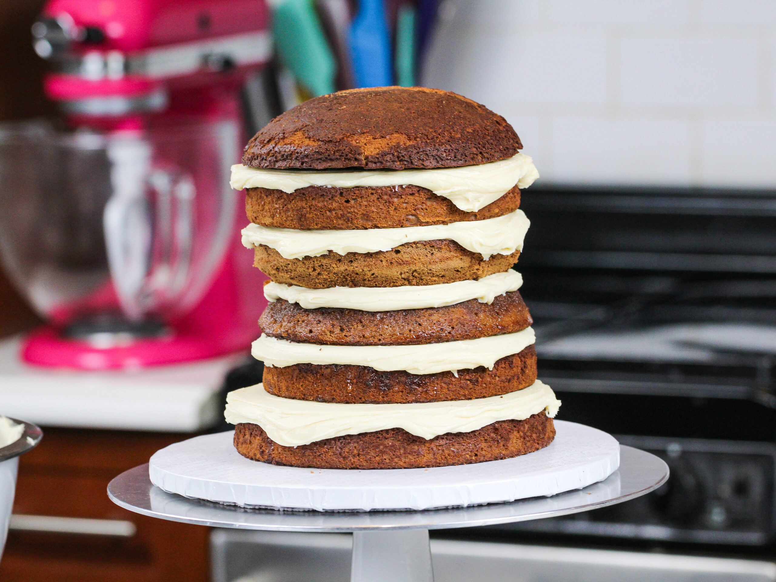 image of stacked chocolate cake layers filled with peanut butter buttercream